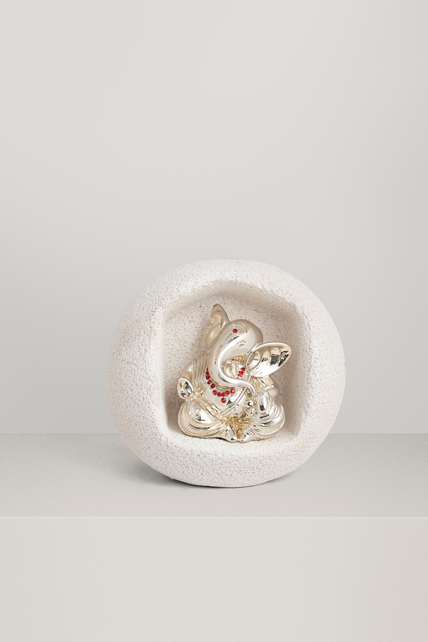 Silver Ganesha in White Enclosure